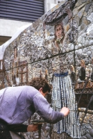 Kennedy points up between the blocks. The Seller of Fish appears behind. - click to enlarge Kennedy points up between the blocks. The Seller of Fish appears behind.