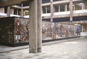 A view of the whole mural, which faced directly onto the Woolwich Road. The hospital was state-of-the-art design in the late 1960s but the concrete structure became stained and in this photo taken a year or two later appears rather grim. The textures and colours of the mural did enliven the building. - click to enlarge A view of the whole mural, which faced directly onto the Woolwich Road. The hospital was state-of-the-art design in the late 1960s but the concrete structure became stained and in this photo taken a year or two later appears rather grim. The textures and colours of the mural did enliven the building.