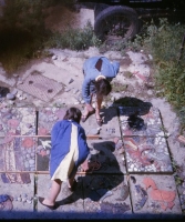 A view taken from above shows blocks to the right which have been completed and a block with shuttering in the centre where the girls are working into the wet cement. Stones are still being arranged on other blocks. - click to enlarge A view taken from above shows blocks to the right which have been completed and a block with shuttering in the centre where the girls are working into the wet cement. Stones are still being arranged on other blocks.