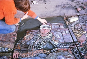 I had two assistants helping me to assemble the mural at Yeadon. Here one is seen placing the pieces of the motorcyclist into the cement render. (The same figure appeared on my studio floor in previous photos) - click to enlarge I had two assistants helping me to assemble the mural at Yeadon. Here one is seen placing the pieces of the motorcyclist into the cement render. (The same figure appeared on my studio floor in previous photos)