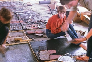 Ceramic is placed into the wet cement. The shuttering around the block can be seen. - click to enlarge Ceramic is placed into the wet cement. The shuttering around the block can be seen.