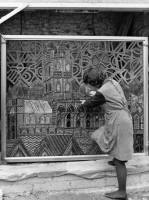 Philippa posing with the Gloucester Cathedral mural