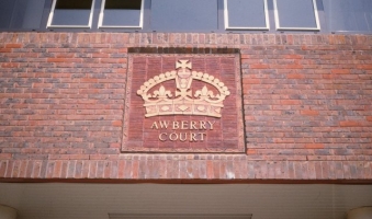 The Crown watermark panel on Awberry Court.