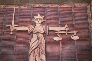 Enlargement of the Symbol of Justice on The Courtyards. The only panel remaining as of May 2016.