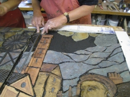 Embedding the ceramic pieces and slate into resin