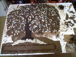 The background of the tree is cut away which leave spaces for the white stones at a later stage - click to enlarge The background of the tree is cut away which leave spaces for the white stones at a later stage