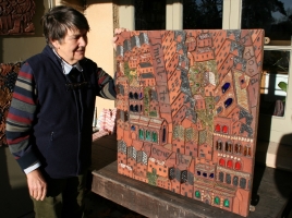 Philippa admires one of the nine panels now back at our workshops in December 2014. - click to enlarge Philippa admires one of the nine panels now back at our workshops in December 2014.
